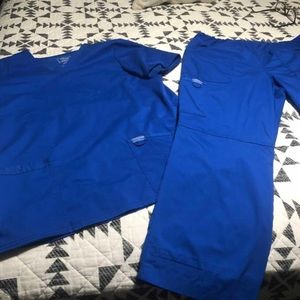 Cherokee revolution royal blue scrubs. Top large.Bottoms size large petite.